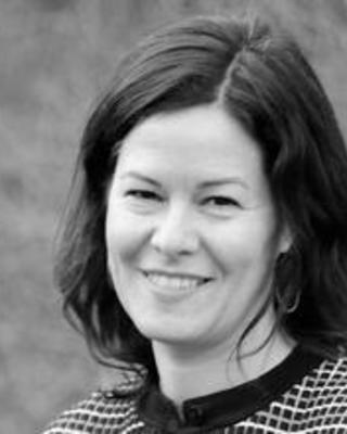 tania_bw_headshot_noglasses_1.jpg